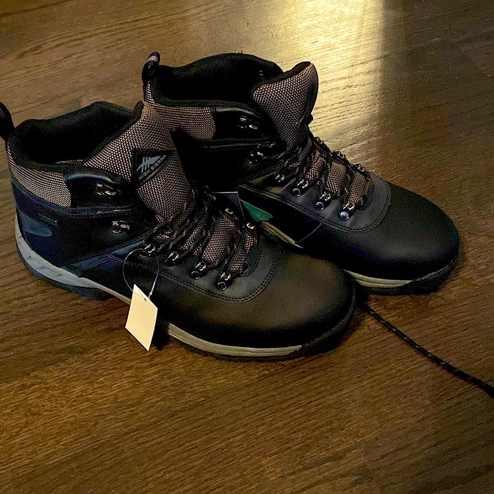 Men’s high sierra black waterproof boots.  New with tags